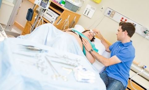 Newborn baby receiving hospital care