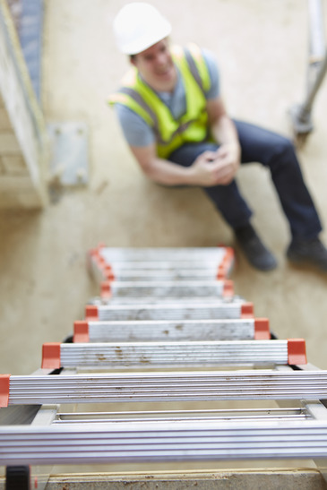 Injured worker at a job site